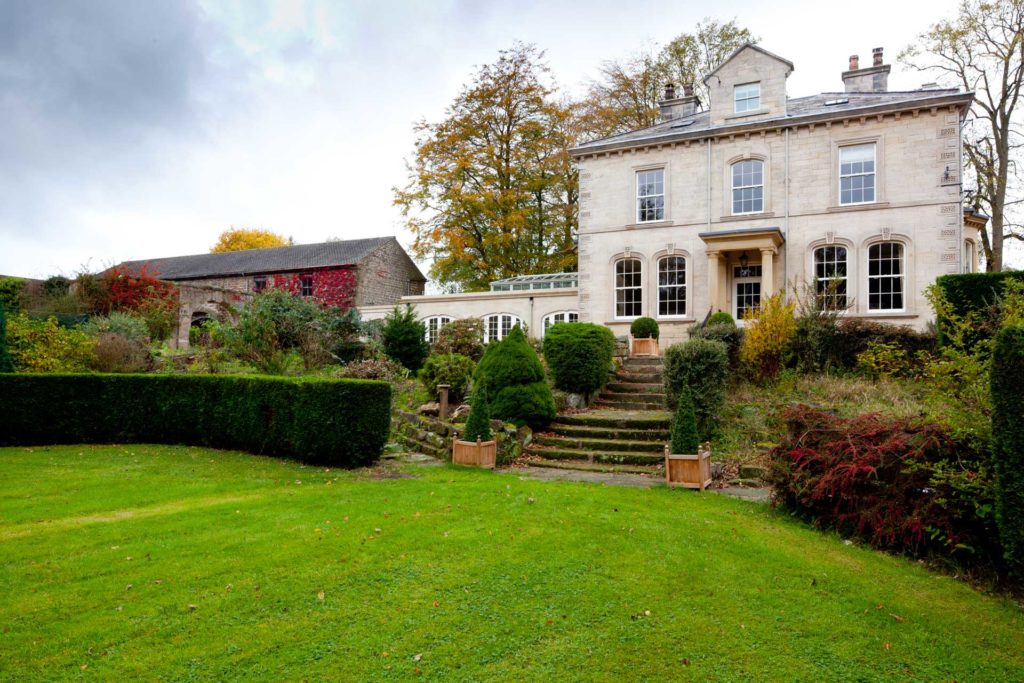 The exterior of a country Manor House with complimentary technologies.