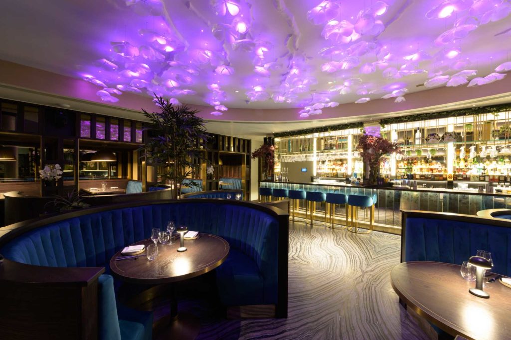 A luxurious restaurant with colour changing and effects lighting, with high-quality audio.
